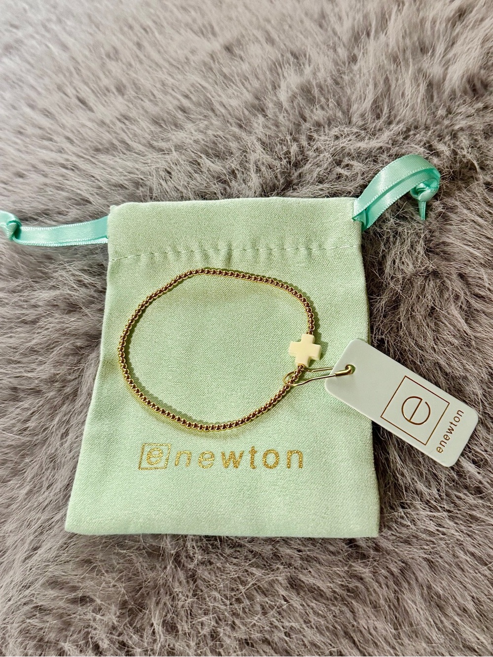 enewton Signature Cross (off-white) & Gold Bead Bracelet New